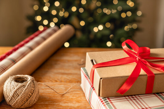 Christmas gift with red ribbon and twine