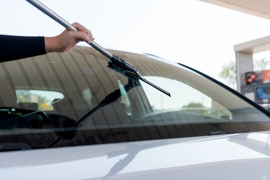 Replace windshield wiper blade on car at service station