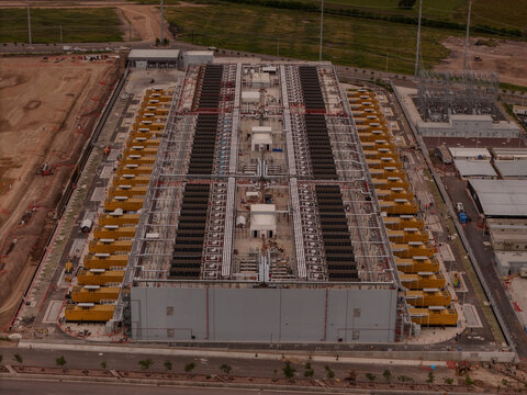 Parque Industrial PyME, Queretaro, Mexico - 18 September 2026: Aerial view of ODATA QR03 data center with rows of cooling units and industrial infrastructure in an expansive site.