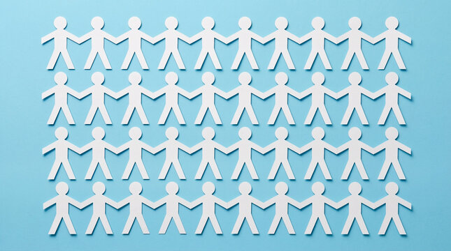 Rows of connected paper people holding hands on a blue background perfect for global community teamwork unity and social connection concepts