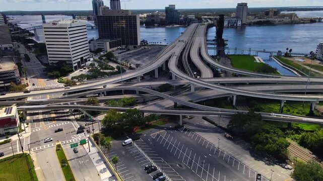 Aerial 4K video pans right across overpasses and the Jacksonville waterfront.
