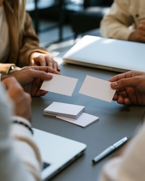 Compensation Specialist and Manager Preparing Pay Transparency Cards at HR Meeting