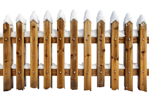 Snow covered wooden picket fence on black background