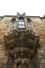 Low angle view of a carved Gothic oriel window at Lincoln Castle © The Nott'm Lass