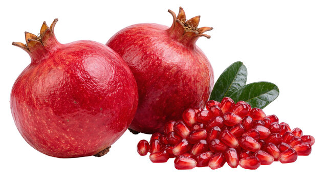 Two ripe red pomegranates with arils and leaves, isolated on transparent background