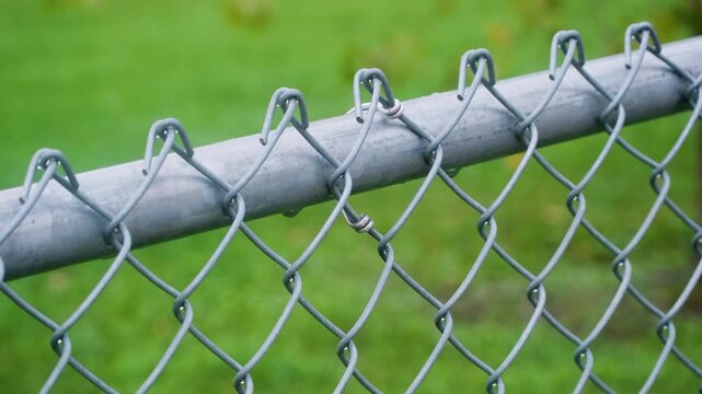 Metal Chain Link Fence Covered in Rain Video