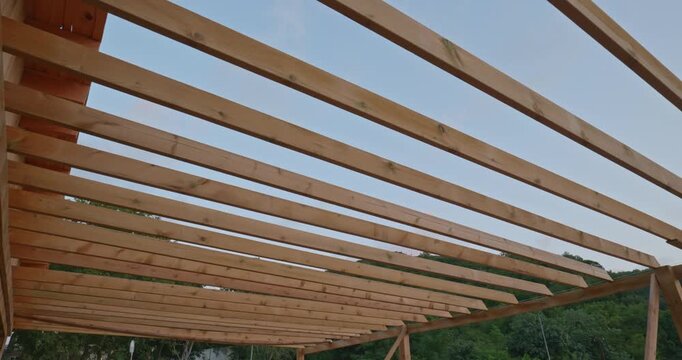 Parallel Wooden Roof Rafters and Beams in a Newly Built Roof Structure
