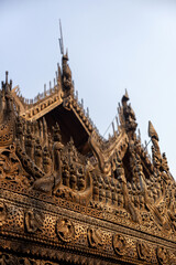 Carved Birds Along the Shwenandaw Eaves © Kaitlind