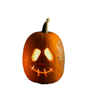 halloween pumpkin head jack lantern with burning candles,
