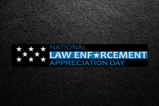 Law enforcement appreciation day is observed every year on January 9. Inscription on black textured background with with transparent American flag.