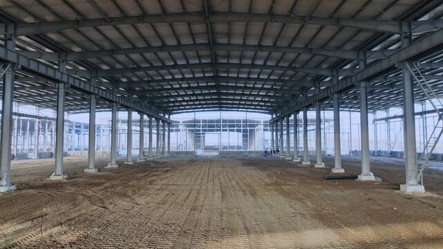 Interior of a large steel frame industrial building under construction