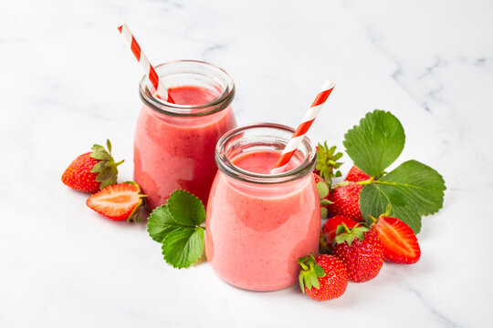 Strawberry smoothie or milkshake drink.
