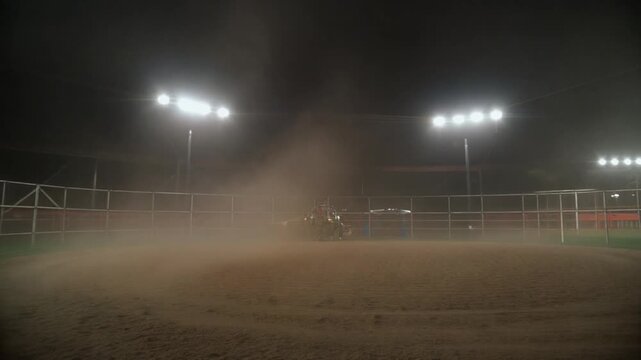 Dust settling in a rodeo arena