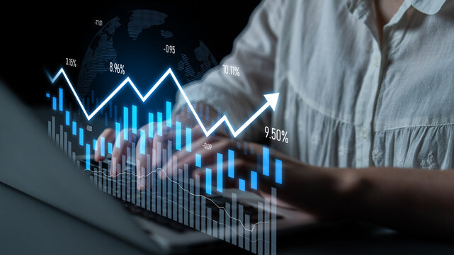 A close-up view of hands typing on a laptop keyboard, accompanied by animated stock market graphs and charts indicating financial growth and investment insights. Scalp