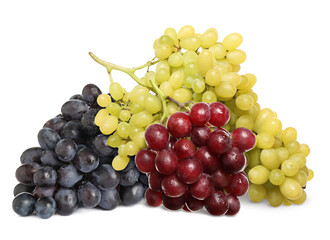 Obraz premium Bunches of red, green and black grapes isolated on white
