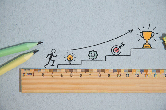 Growth Path from Idea to Success with Ruler and Creative Business Icons.