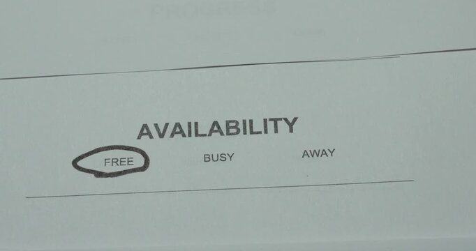 Close-up of an availability status scale with Free circled. Concept for available status, scheduling, free time, appointments, workforce availability and planning.
