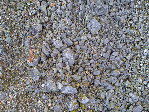 Aerial View Of Rocky Scree Slope With Lichen-Covered Stones In Mountain Terrain, British Columbia