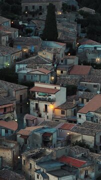 Old houses in the city of Gerace at night, after sunset