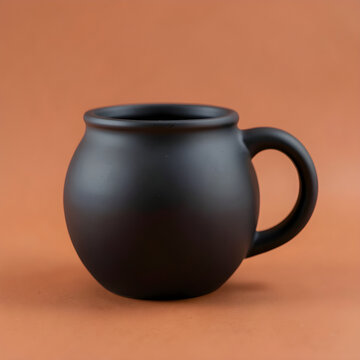 Ceramic cauldron mug with a single broad handle