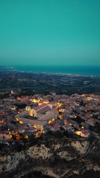 Gerace at night with the illuminated cathedral, in Calabria