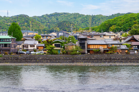 Scenic historic townscape of Uji, the matcha capital, on the banks of Uji River in Kyoto, Japan, a city famous for its deeply rooted cultural traditions, green tea heritage and ancient architecture.