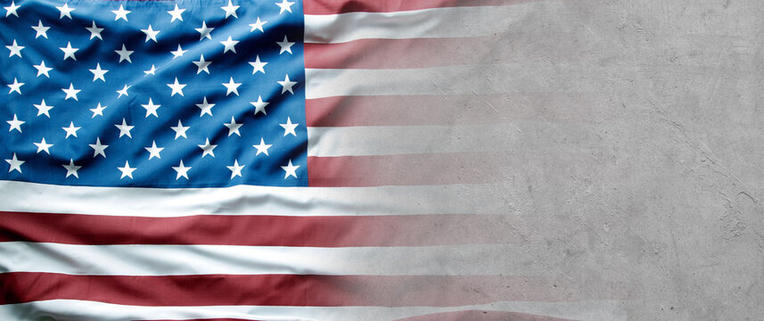 American flag on grey wall