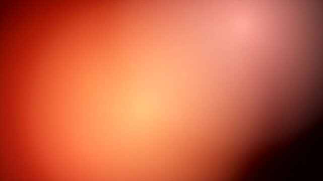 Vivid abstract orange background with soft gradient blur effect