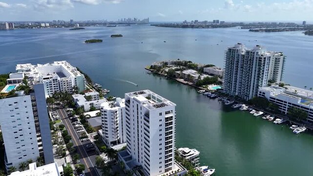 Aerial Drone Orbit Over Miami Bayfront Condos with Rooftop Pool and Yachts, HD