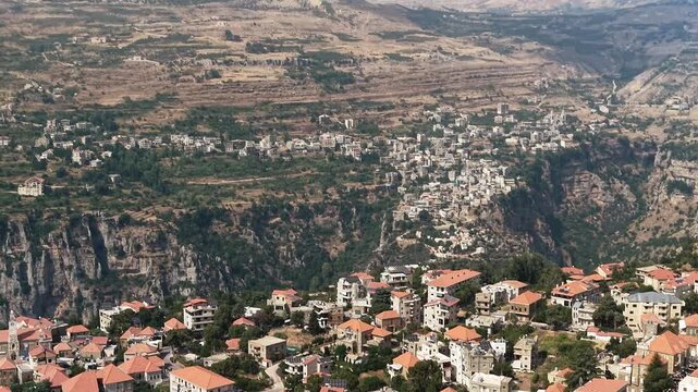 Aerial Drone View of Mountain Village and Green Valley in Hasroun,  Lebanon