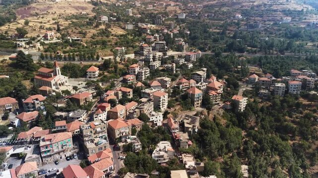Aerial Drone View of Mountain Village and Green Valley in Hasroun,  Lebanon