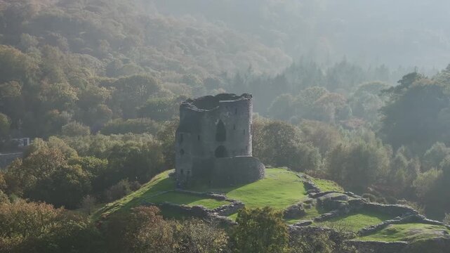 Autumn over Ruins of Dolbadarn Castle from a drone, Llanberis, Llywelyn, North Wales, UK