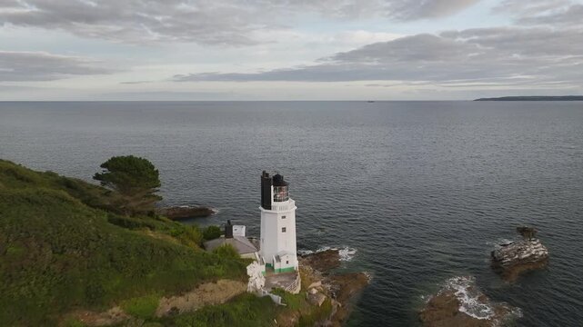 St Anthony Lighthouse from drone, Roseland peninsula, Head circular walk, Cornwall, UK