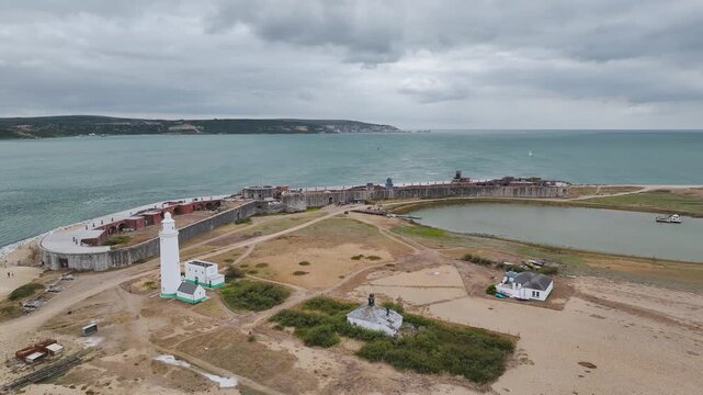 Hurst Point Lighthouse and Hurst Castle from drone over Hurst Spit, Milford on Sea, Lymington, Hampshire, England, United Kingdom