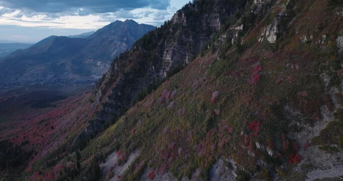 Beautiful Autumn Colors On Side Of Utah Rocky Mountain At Dusk - Aerial Shot