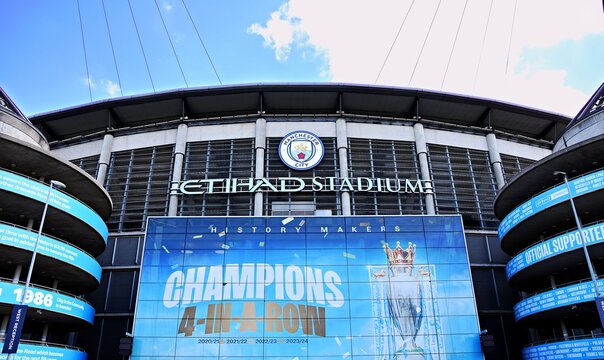 Manchester City Etihad Stadium frontage. Champions 4 in a row.