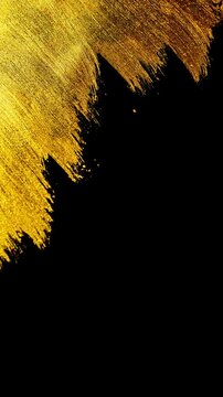 Elegant gold brush strokes texture with glowing metallic paint sweeping on black background   