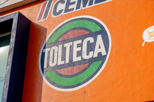 Cemex and Cemento Tolteca logos on Construrama hardware store facade. Jalisco, Mexico, July 20, 2026.