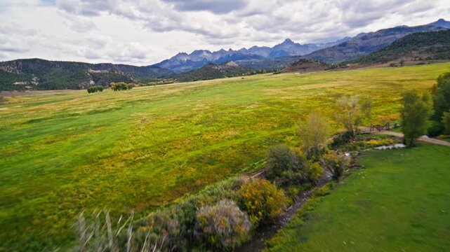 Colorado san juan mountains valley with autumn colors drone fpv video 4K