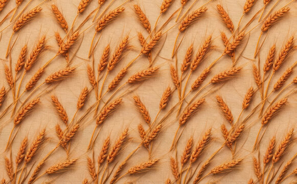 pattern of golden wheat ears on rustic burlap background for autumn harvest concept design and agriculture wallpaper