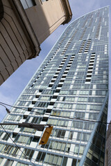Fototapeta premium detail of west elevation of The L Tower, a residential tower, designed by Daniel Libeskind, located at 8 The Esplanade, Toronto