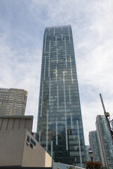 Fototapeta premium north elevation of The L Tower, a residential tower, designed by Daniel Libeskind, located at 8 The Esplanade, Toronto