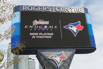Fototapeta premium Rogers Centre Gardiner Pylon LED sign featuring advertising for Avengers Endgame, Toronto