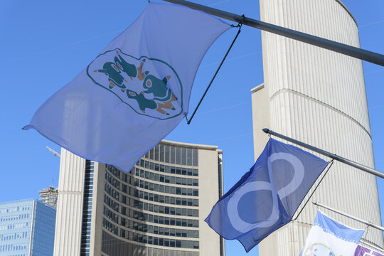 permanent Indigenous flag installation along the east overhead walkway at Nathan Phillips Square, Toronto