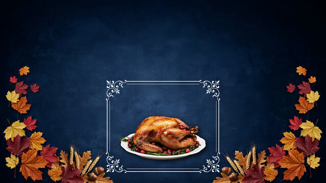 Roasted thanksgiving turkey on a platter with cranberries and herbs, framed by autumn leaves and wheat on a dark blue textured background
