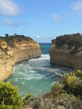 Towering limestone cliffs and turquoise water at Loch Ard Gorge on the Great Ocean Road, Victoria, Australia