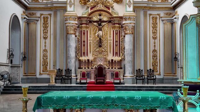 Cathedral altar with crucifix, Dumaguete, Philippines