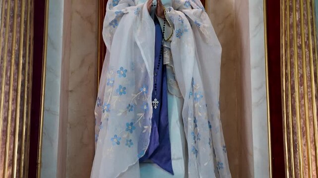 Statue of Virgin Mary in church niche, Dumaguete, Philippines