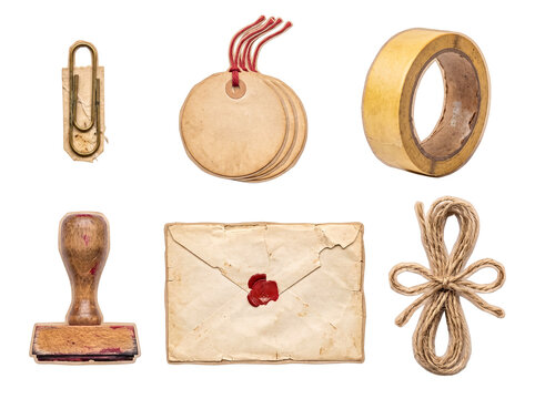 Assortment of vintage office and craft supplies with tags and twine