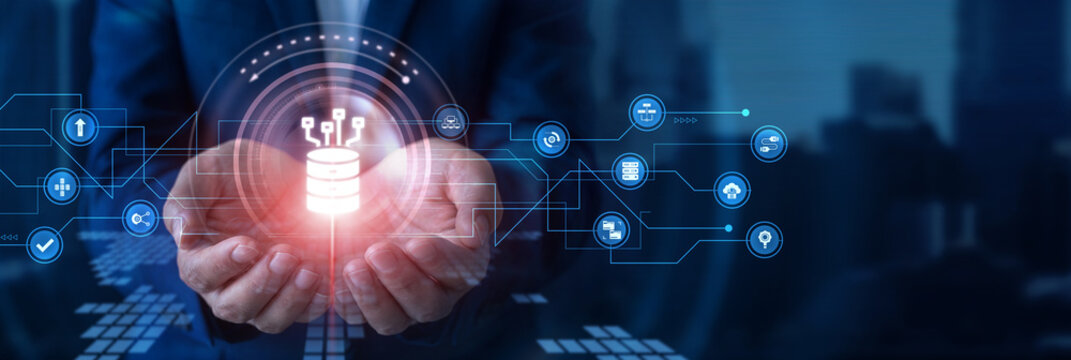 Data analyst holding Big Data icon and massive database information processing network analytics intelligence system. Deep insight engine.